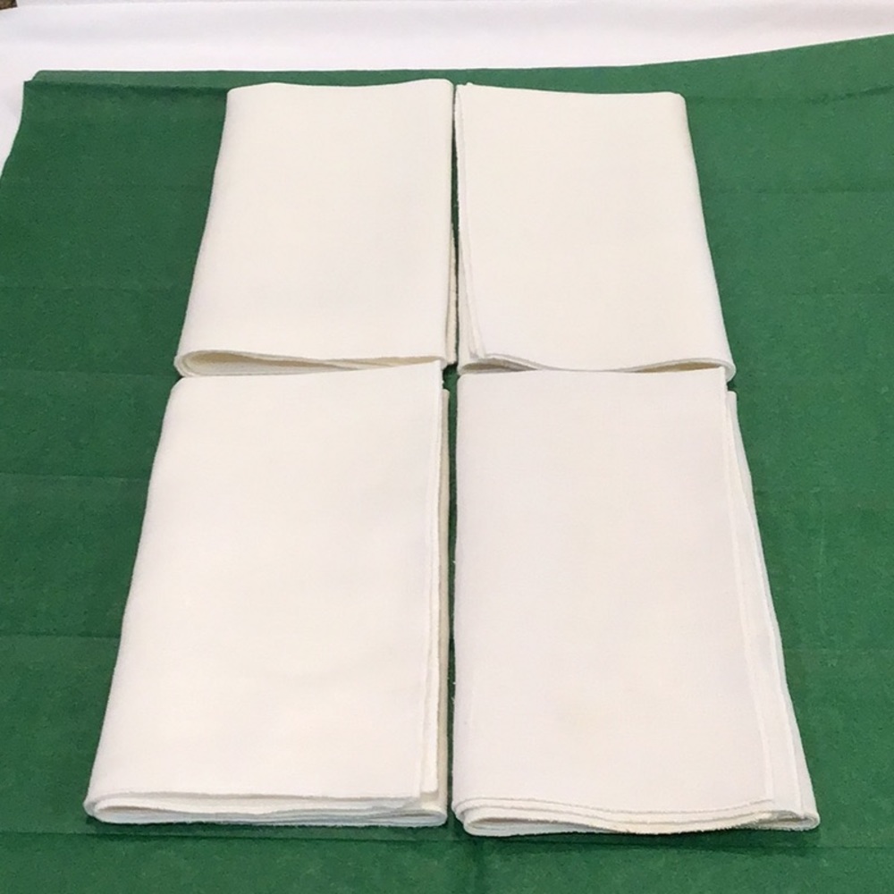 Four large linen patterned napkins